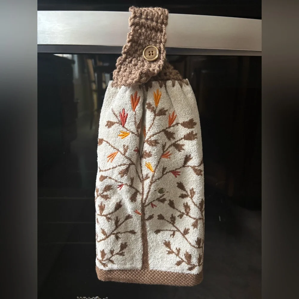 Hand crocheted fall tan/brown towel with embroidered leaves and bird